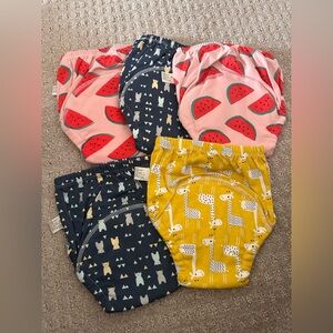 New set of 5 UPAIRY training pants mixer sizes 3 Large and 2 Medium